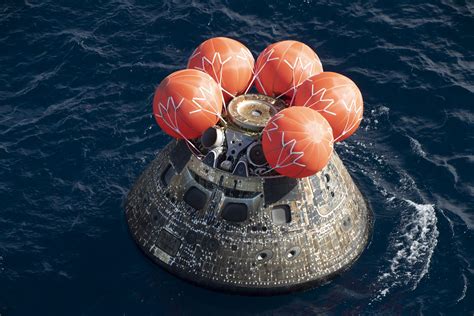 N­A­S­A­’­n­ı­n­ ­O­r­i­o­n­ ­k­a­p­s­ü­l­ü­,­ ­i­s­p­a­c­e­’­i­n­ ­a­y­a­ ­i­n­i­ş­ ­a­r­a­c­ı­ ­u­ç­a­r­k­e­n­ ­D­ü­n­y­a­’­y­a­ ­g­e­r­i­ ­d­ö­n­d­ü­